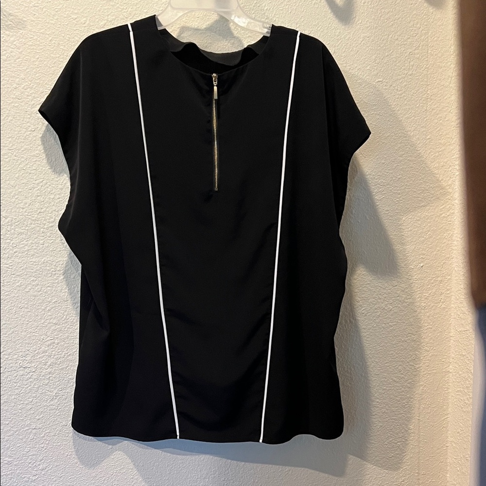 Elegant Black Blouse with White Accents